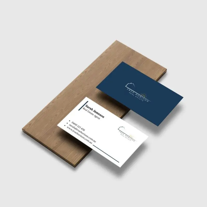 Front and back graphic design business card mockup on wooden plank showcasing package and print design services for small businesses in Australia
