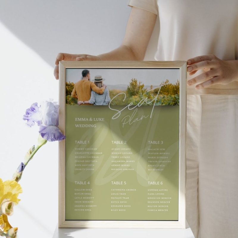 Custom wedding seating plan design held in elegant frame for wedding event signage and graphic design services in Australia